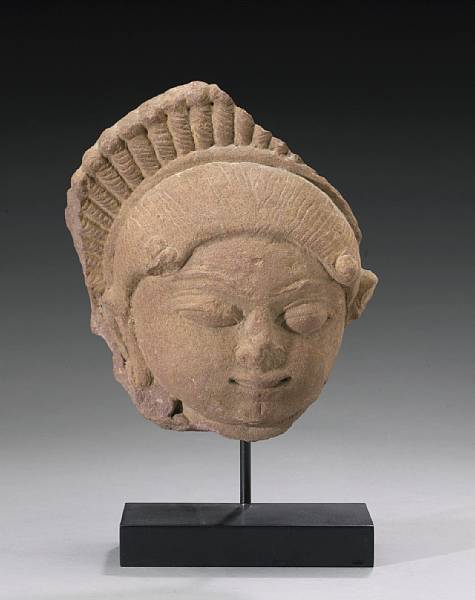 Appraisal: A red sandstone fragment of a female head th th