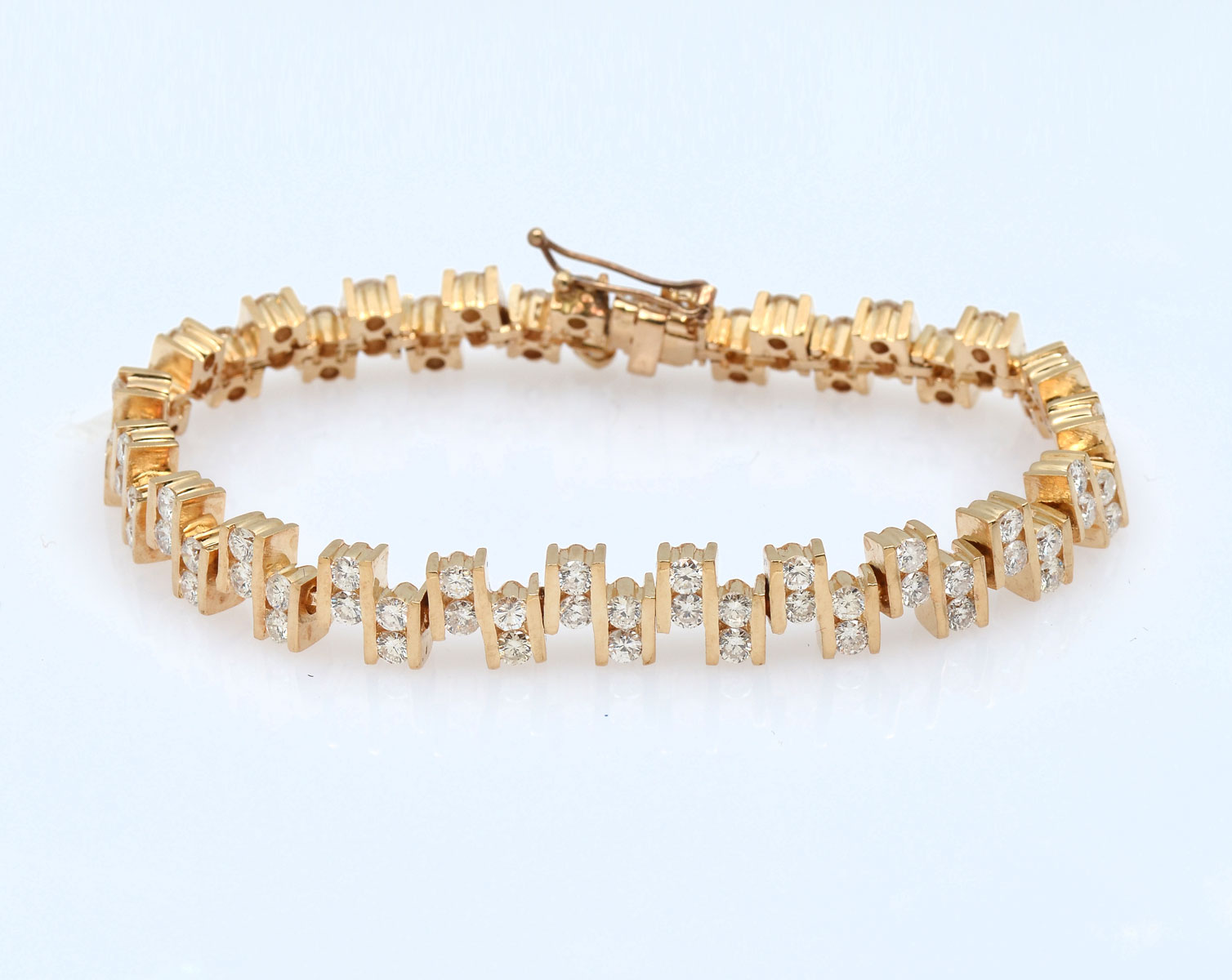 Appraisal: K CTW DIAMOND BRACELET K yellow gold bracelet contains round