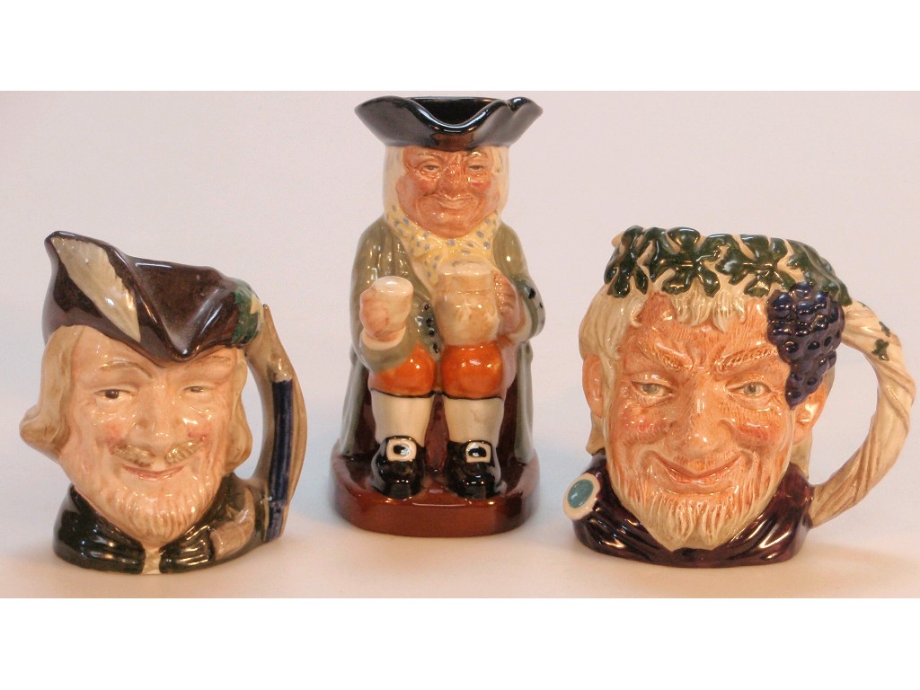 Appraisal: Three small Doulton character jugs Bachus D Robin hood D