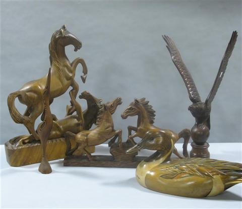 Appraisal: GROUP OF WOODEN SCULPTURE Comprising a horse groups a standing