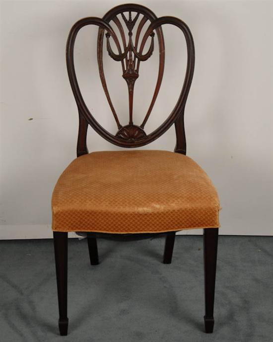 Appraisal: A Hepplewhite-style Mahogany Shield-back Side Chair having a palmetto and