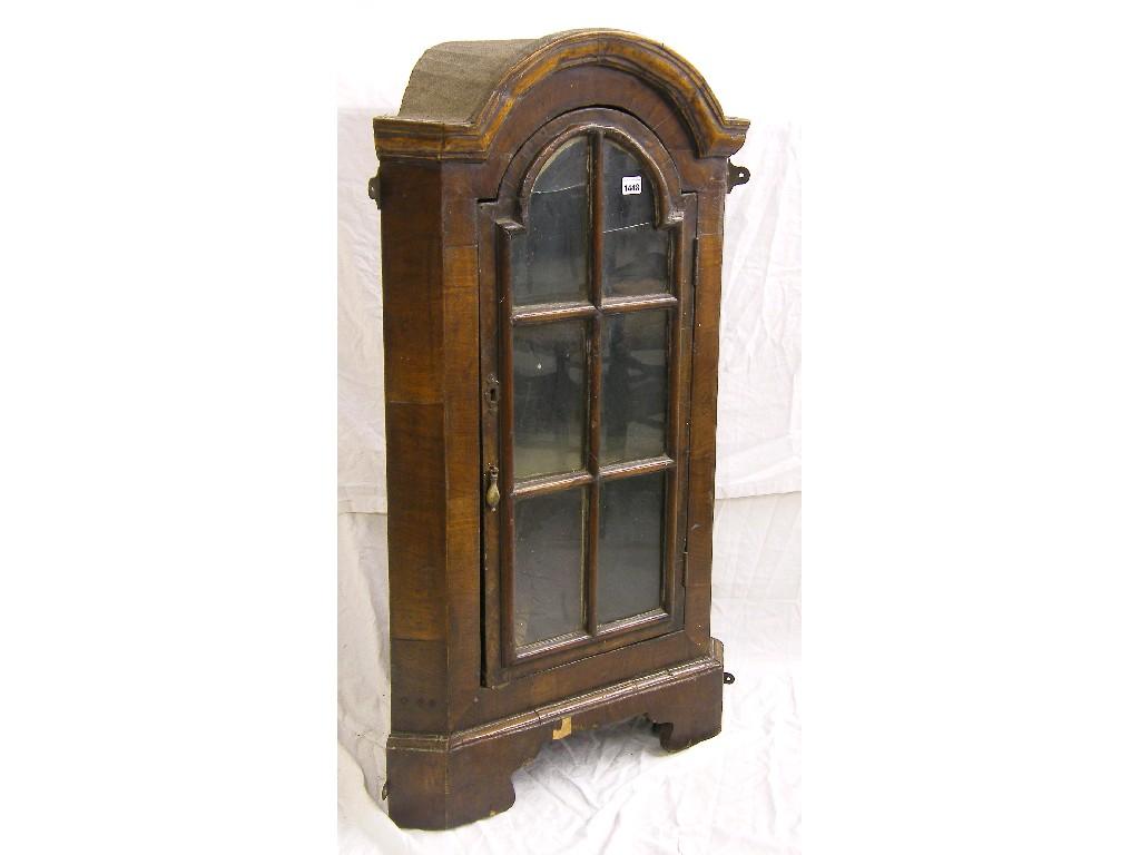 Appraisal: th century walnut veneered corner display cabinet the dome moulded