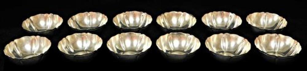 Appraisal: SILVER Set of twelve Mexican silver lobed petal form bowls