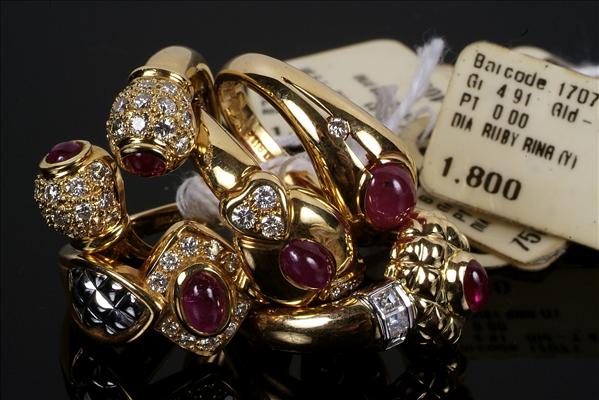 Appraisal: A ruby and diamond ring designed as two spherical terminals