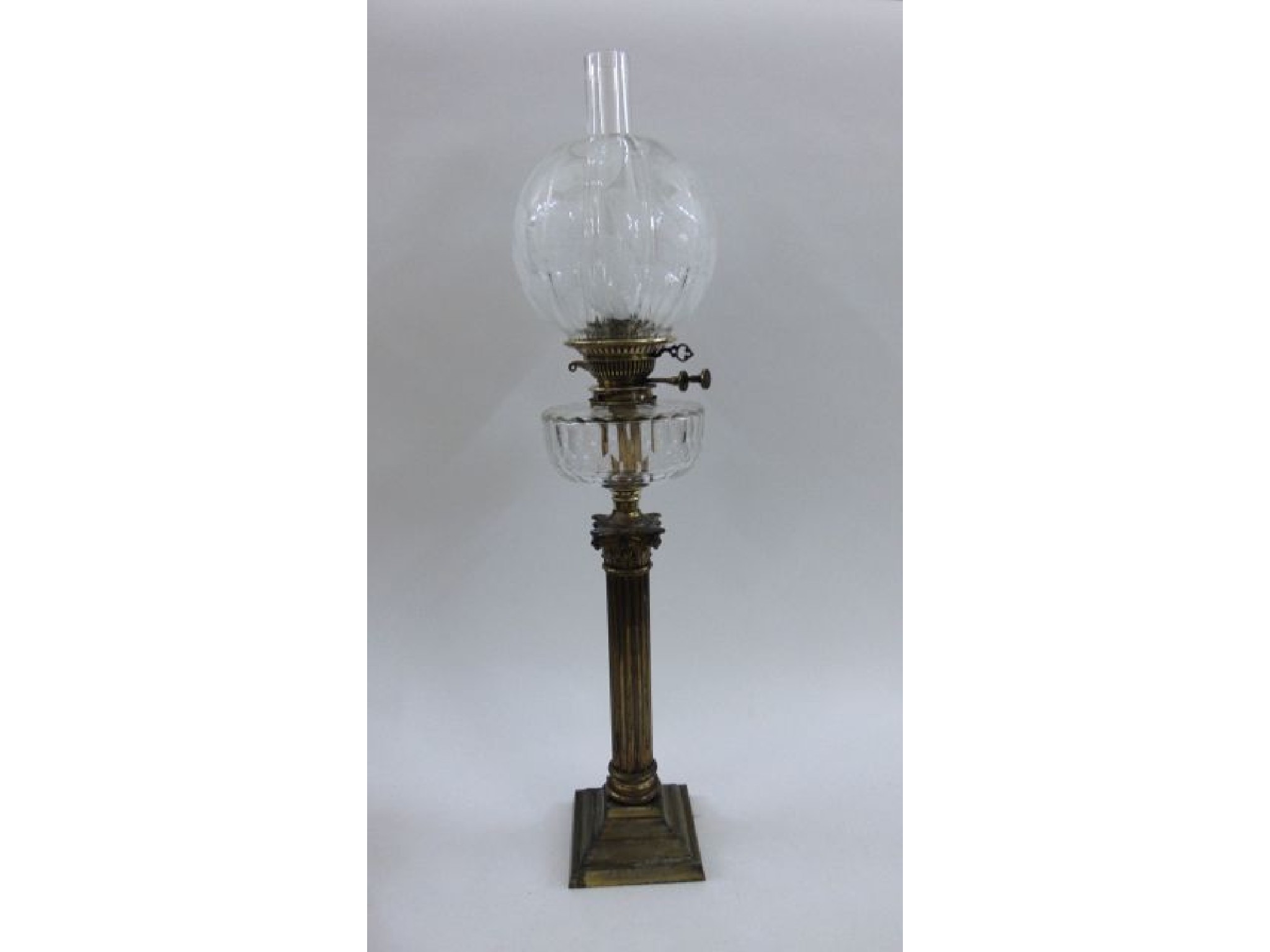 Appraisal: A late th century banqueting lamp with later decorated globe