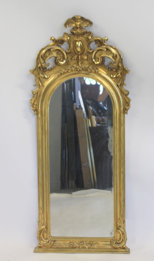 Appraisal: th Century Giltwood Mirror With Carved Crown Good size with