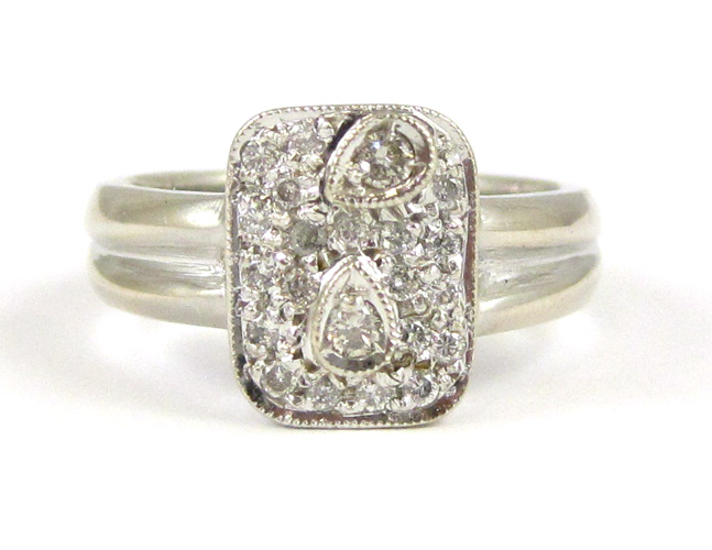 Appraisal: DIAMOND AND EIGHTEEN KARAT WHITE GOLD RING with pave' set