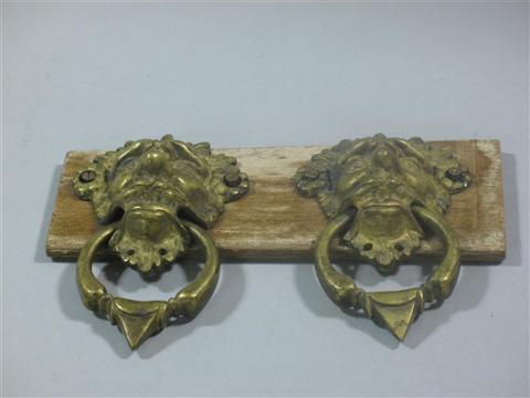 Appraisal: CONTINENTAL GILT-BRONZE LOOSE RING HANDLES Each cast as a anthropomorphic