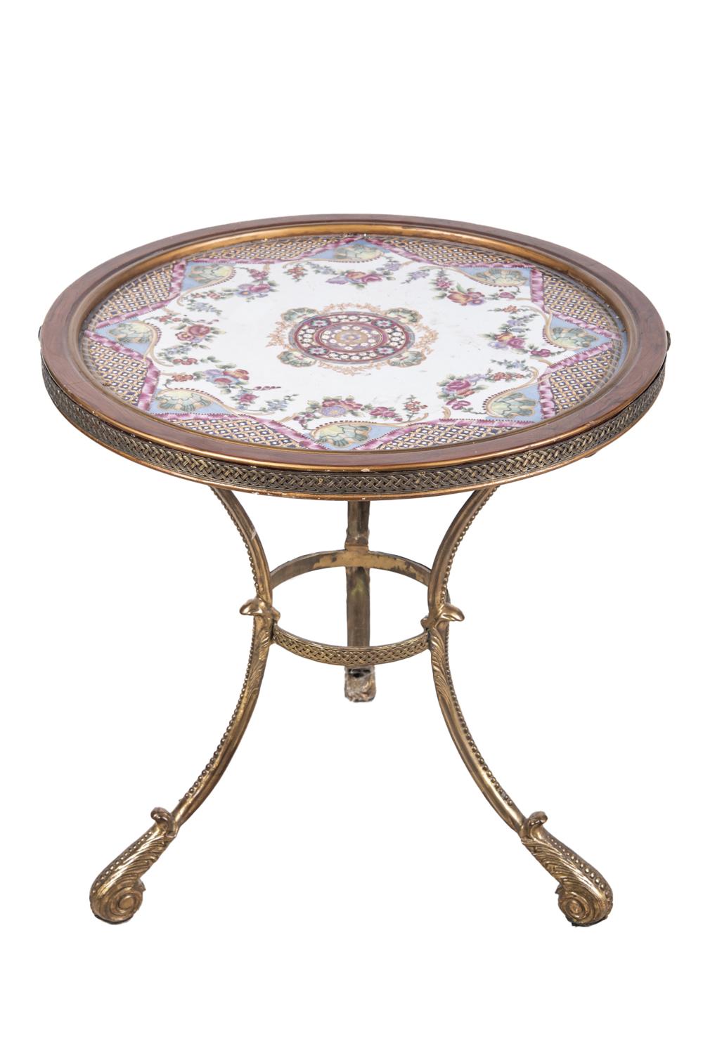 Appraisal: FRENCH STYLE PORCELAIN AND GILT MOUNTED GUERIDONCondition with slight cracking