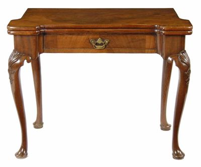 Appraisal: A George II mahogany card table the hinged top with