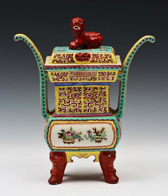 Appraisal: A CHINESE PORCELAIN TWO HANDLED CENSER and cover with dog