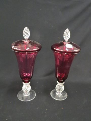 Appraisal: Pair of Cranberry Art Glass Urns clear swirling pedestal base