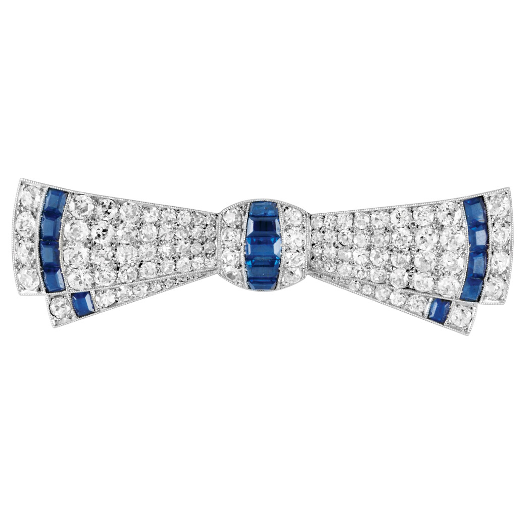 Appraisal: Art Deco Platinum Diamond and Sapphire Bow Brooch diamonds ap