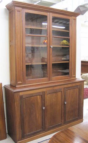 Appraisal: LARGE MAHOGANY BOOKCASE ON CUPBOARD American c The top section