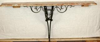 Appraisal: French Rococo style scrolled iron console with marble French Rococo