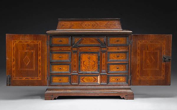 Appraisal: A Flemish Baroque inlaid walnut table cabinet early th century