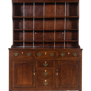 Appraisal: An English Oak Welsh Cupboard Late th Century Height x