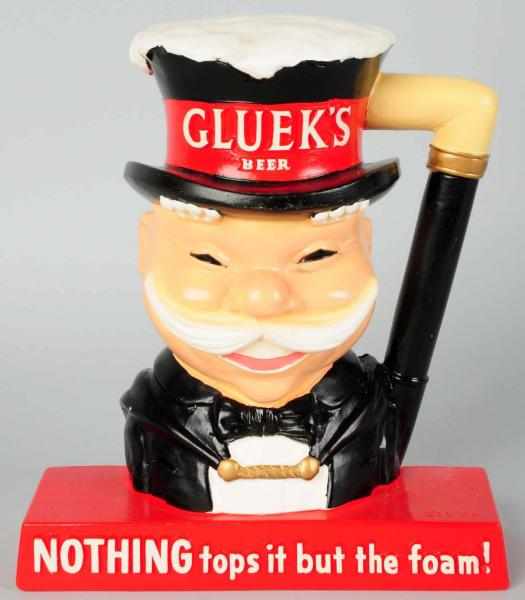 Appraisal: Gluek's Beer Advertising Figure s Plaster Condition Excellent Size -