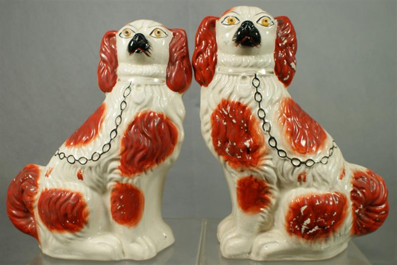 Appraisal: Pr Staffordshire white rust spaniels black gilt trim craquelure and