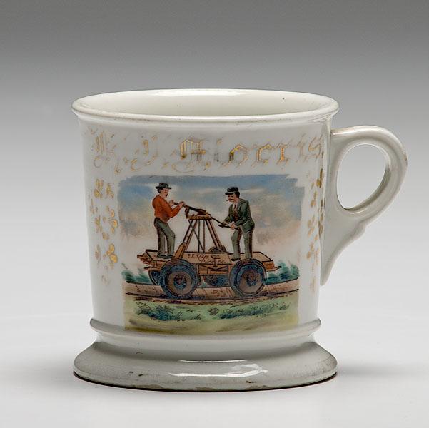 Appraisal: OCCUPATIONAL SHAVING MUG OF RAILROADMEN ON HANDCART SIGNED E E