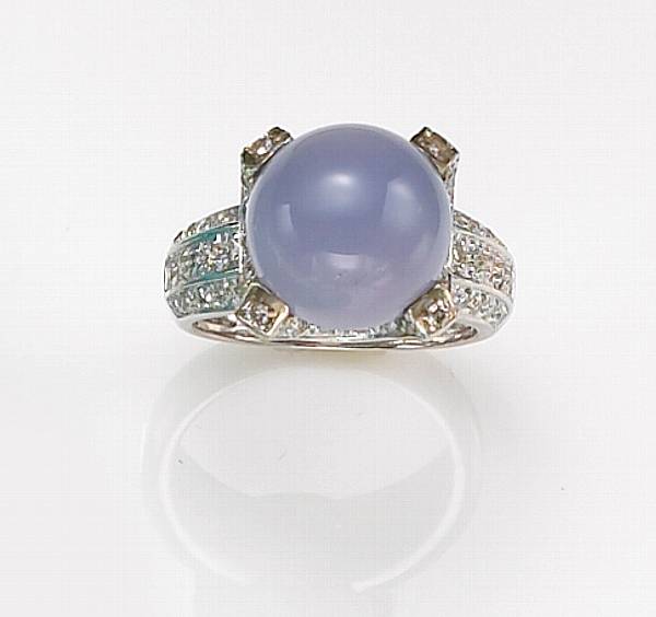 Appraisal: Blue Chalcedony and Diamond Ring Set with a circular cabochon