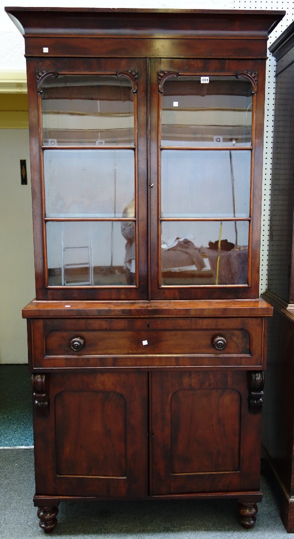 Appraisal: A Victorian mahogany secretaire bookcase cabinet the pair of glazed