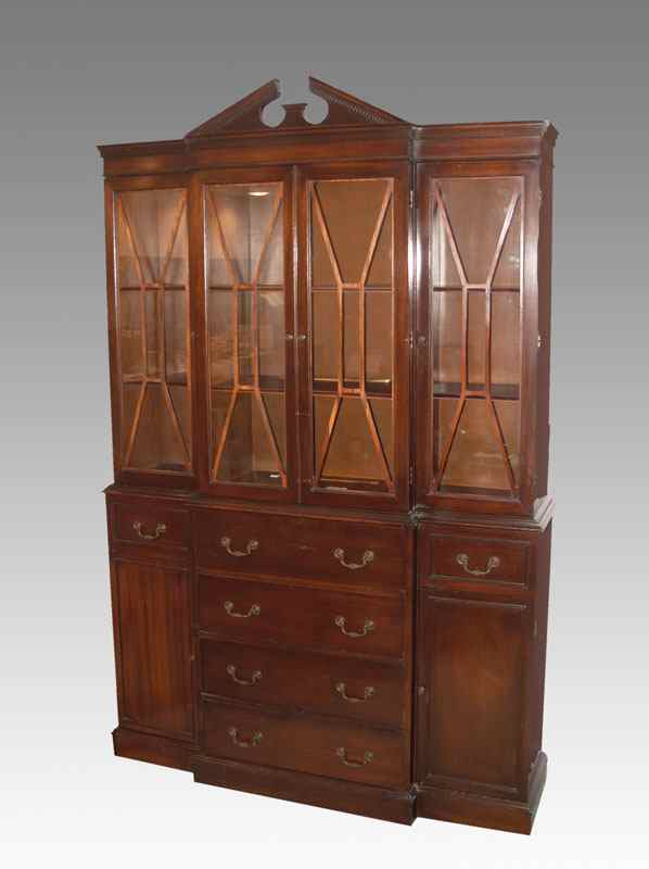 Appraisal: MAHOGANY BREAKFRONT SECRETARY CABINET Four glass door bookcase or china