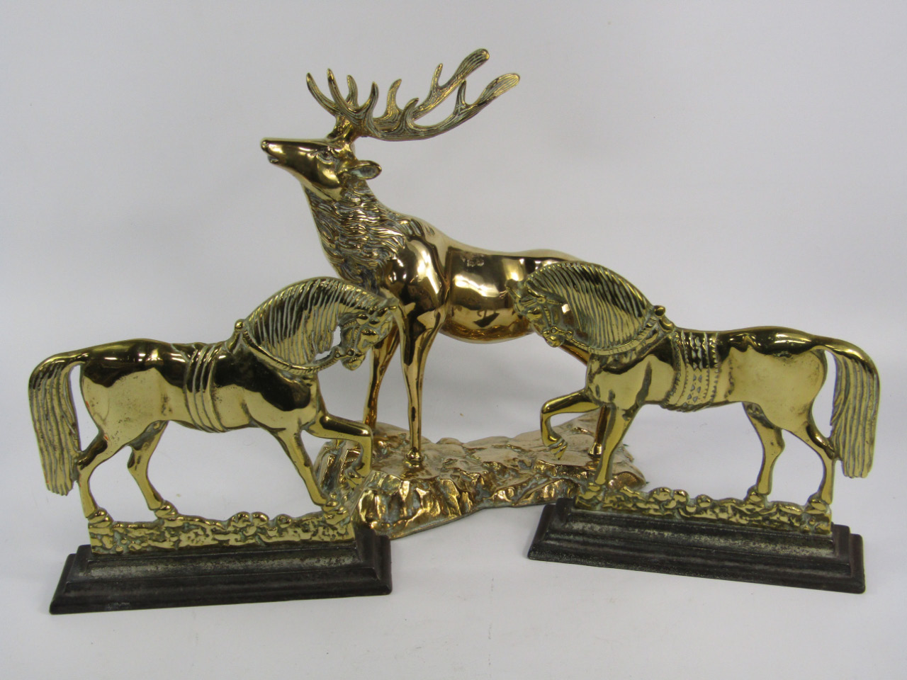 Appraisal: A pair of Victorian brass door stops cast as prancing