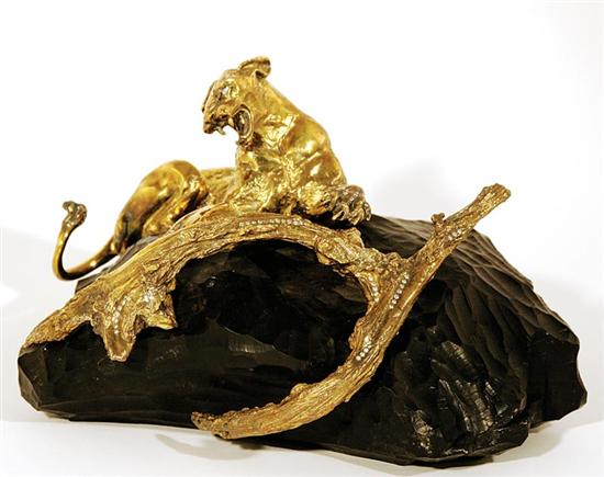 Appraisal: Diamond studded gilt-bronze panther sculpture snarling beast lying upon chiseled