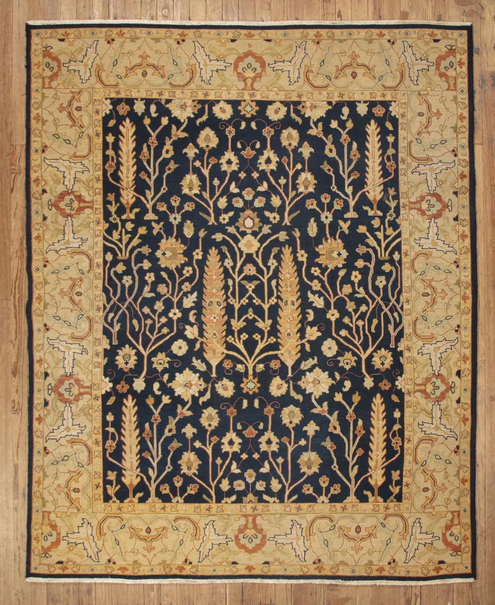 Appraisal: Persian Carpet blue ground stylized floral design ft in x