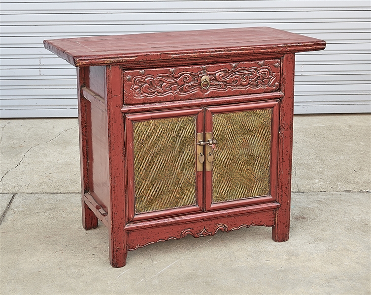 Appraisal: Chinese red hard wood chest carved openwork designed drawer above