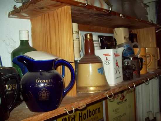 Appraisal: A LARGE COLLECTION OF WHISKEY ADVERTISIGN WATER JUGS