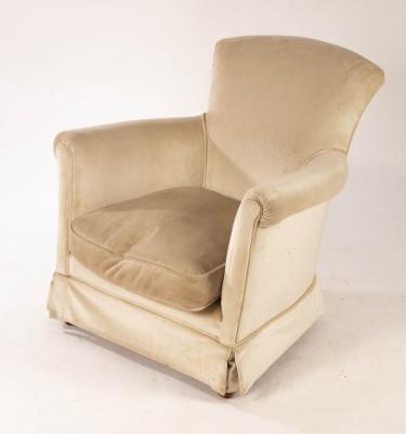 Appraisal: An upholstered tub-shaped chair on turned legs with spiral stretchers