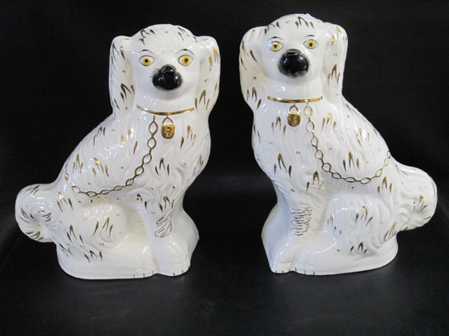 Appraisal: PAIR ENGLISH STAFFORDSHIRE PORCELAIN DOGS in opposing positions each with