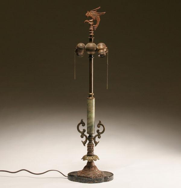 Appraisal: Marble stem table lamp with phoenix finial embossed metal accents