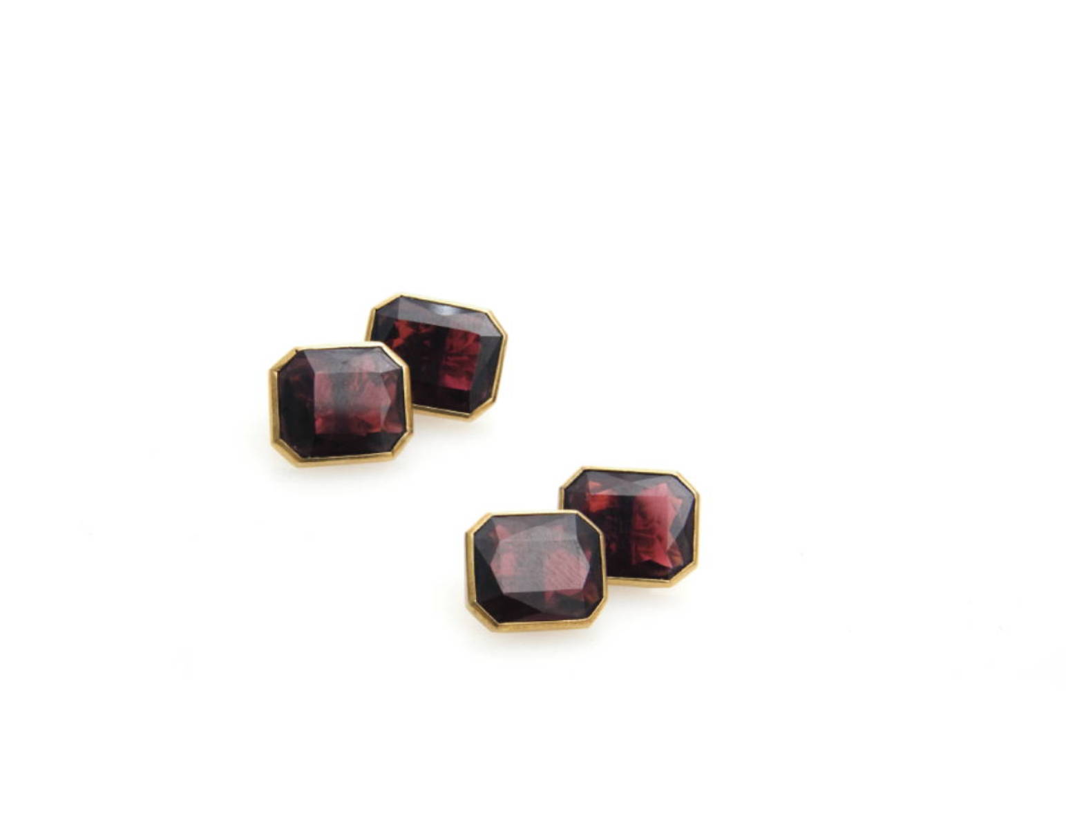 Appraisal: GARNET DOUBLE SIDED CUFF LINKS Rectangular stones with canted corners