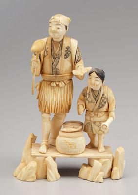 Appraisal: Japanese ivory okimono figural group of man and boy with