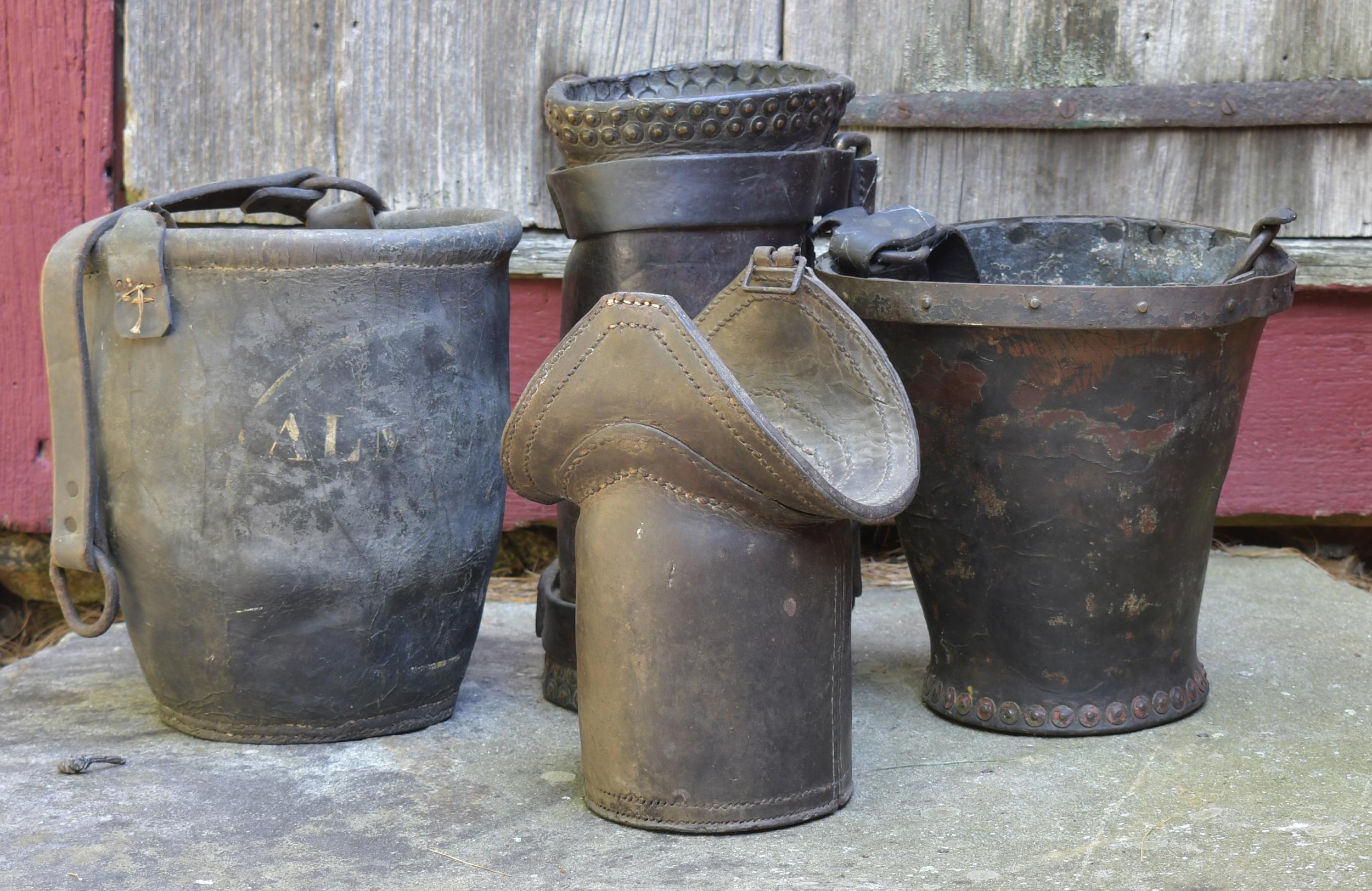 Appraisal: TH C LEATHER FIRE BUCKETS AND VESSELS FOUR PIECES Early