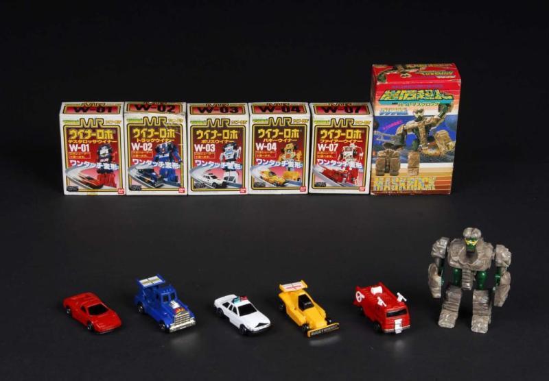 Appraisal: Lot of Toys Description Japanese Made by Bandai Includes Machine