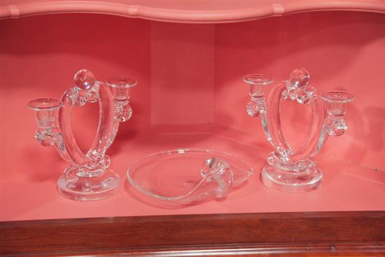 Appraisal: THREE PIECES OF STEUBEN CRYSTAL A pair of double socket