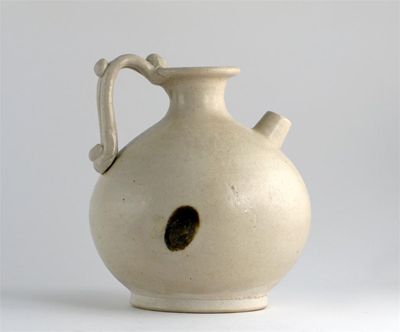 Appraisal: A Chinese stoneware globular ewer with a clear glaze and