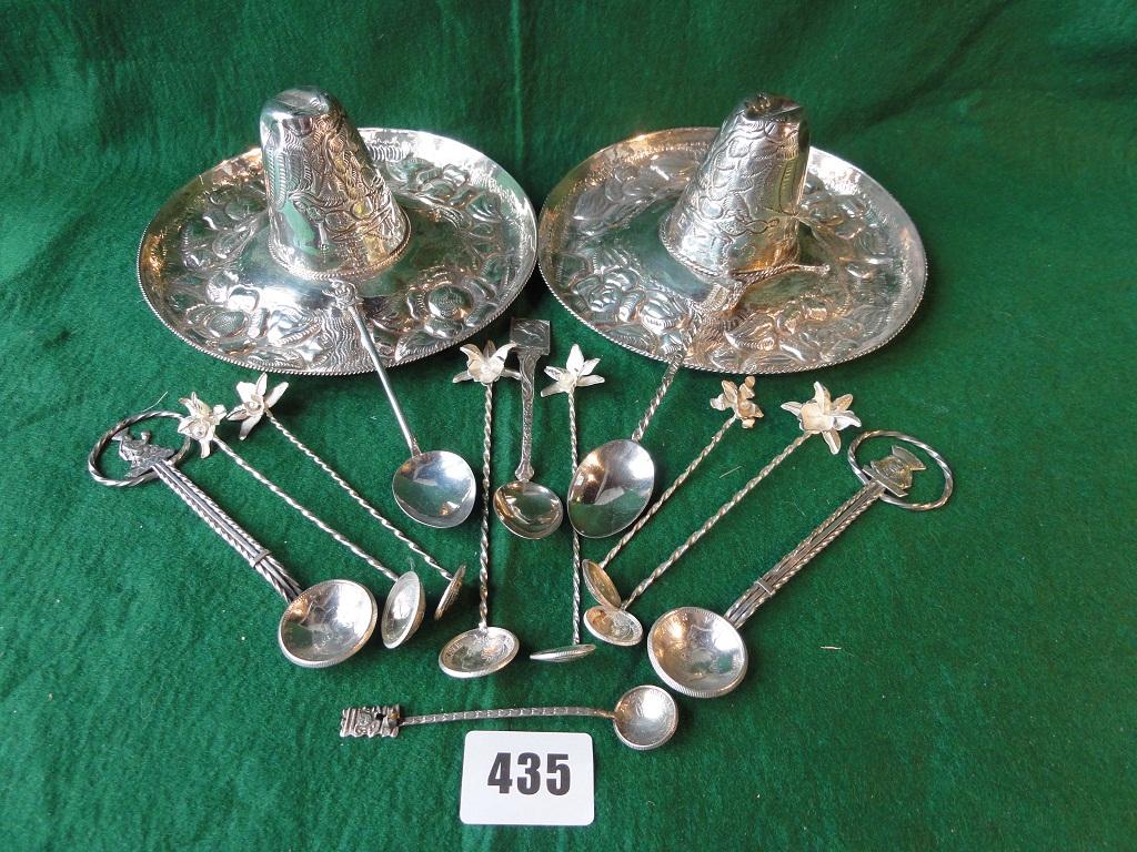 Appraisal: A pair of Mexican silver sombreros stamped nine silver teaspoons