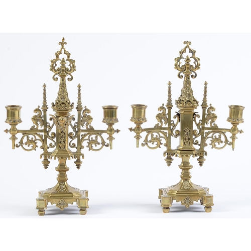 Appraisal: A pair of Victorian brass gothic twin branch candelabra c