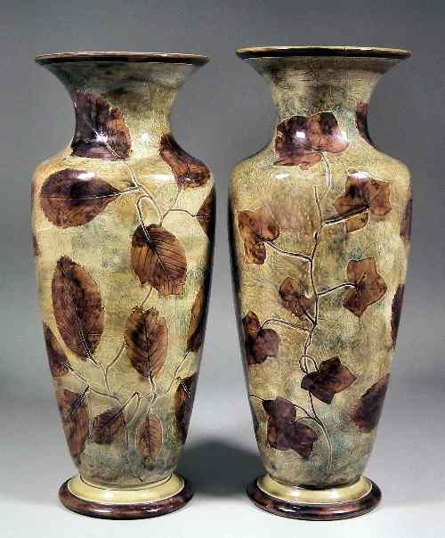 Appraisal: A pair of Royal Doulton stoneware ''Autumn Leaves'' tall vases