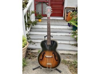 Appraisal: A Harmony acoustic archtop guitar with a steel reinforced neck