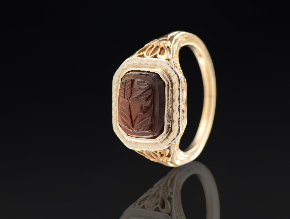 Appraisal: th C VICTORIAN INTAGLIO RING Profusely chased K yellow gold