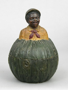 Appraisal: A Ceramic Humidor of a Boy on a Melon A