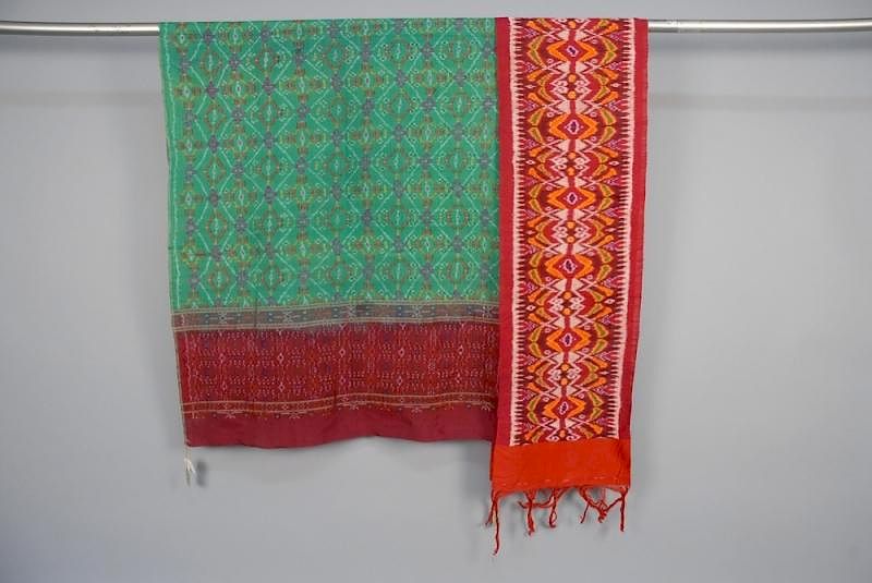 Appraisal: TWO INDONESIAN SILK TEXTILES c One Bali kemben with colorful