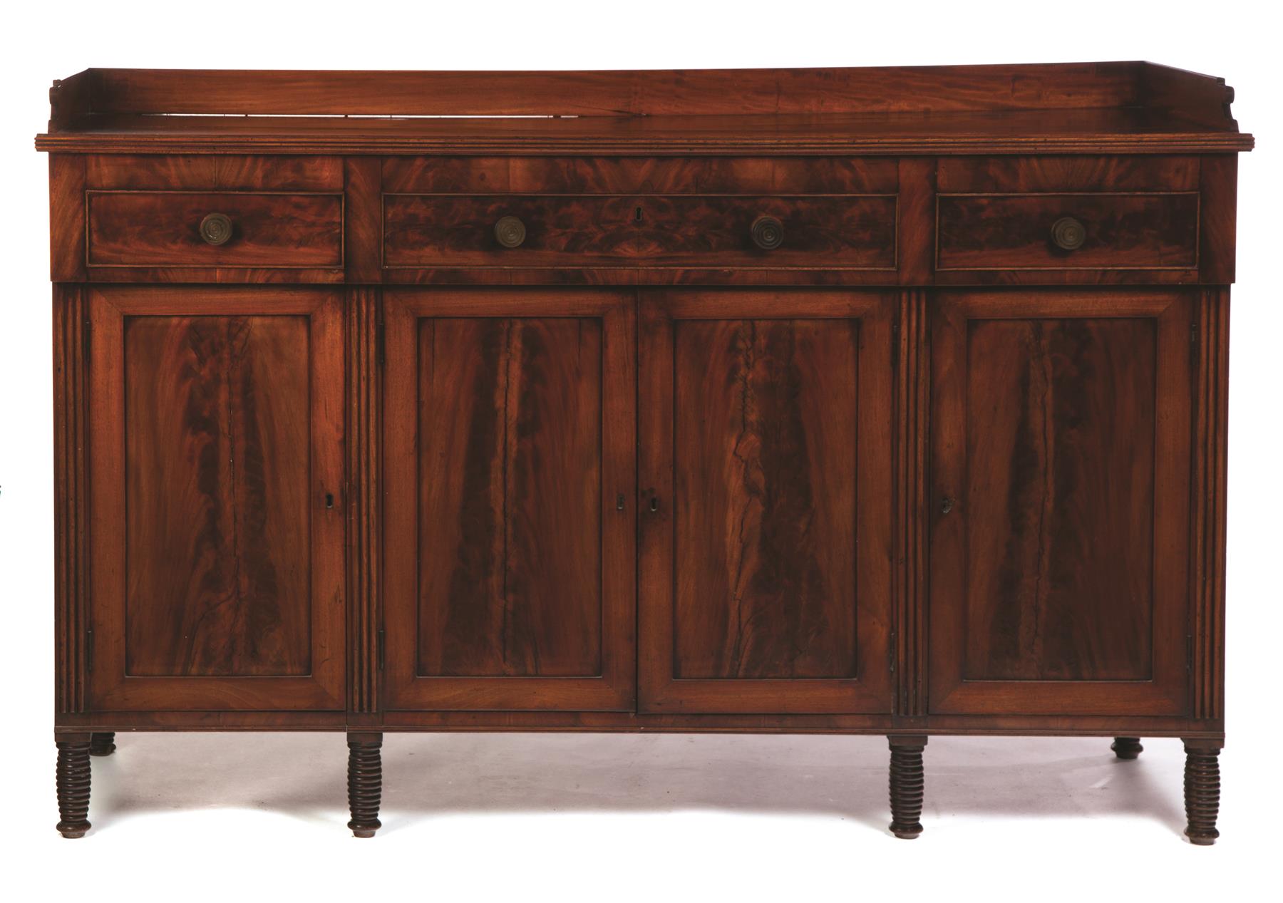 Appraisal: LATE-SHERATON SIDEBOARD American st quarter- th century mahogany Dovetailed gallery