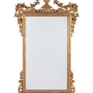 Appraisal: A Neoclassical Style Giltwood Mirror th Century x inches Property